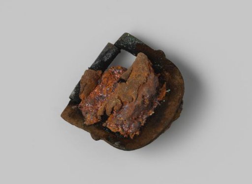 Belt buckle with concretion from the wreck of the East Indiaman Hollandia