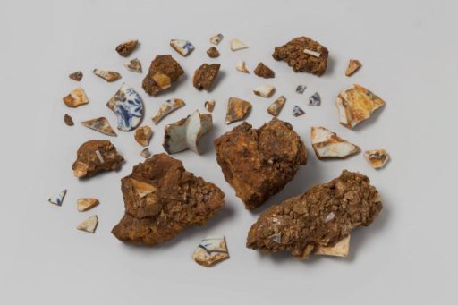 Concretions with fragments of bowls from the wreck of the East Indiaman Hollandia