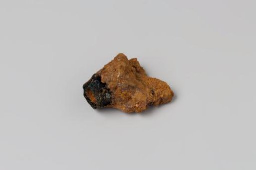 Fragment of a knife handle and copper from the wreck of the East Indiaman Hollandia