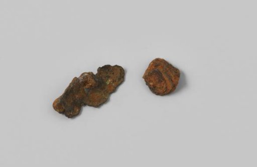 Cartridge case and fragment of hardware from the wreck of the East Indiaman Hollandia