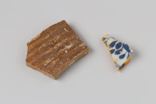 Fragment of porcelain and fragment of stoneware from the wreck of the East Indiaman Hollandia
