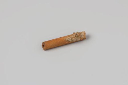 Fragment of a clay pipe stem with concretion from the wreck of the East Indiaman Hollandia