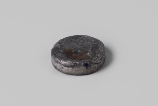 Disc-shaped weight, lead,  from the wreck of the Dutch East India ship Hollandia