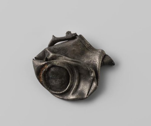 Squashed pewter jug from the wreck of the Dutch East Indiaman Hollandia