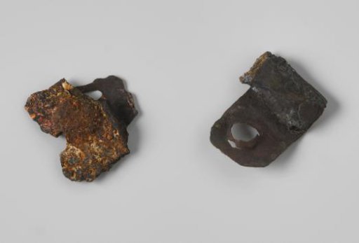 Ear of a cartridge tube and metal strips from the wreck of the Dutch East Indiaman Hollandia
