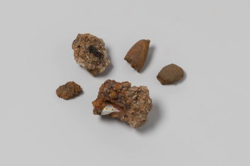 Fragment of concretion with pieces of glass and iron from the wreck of the East Indiaman Hollandia