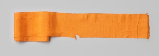 Ribbon belonging to the national festive dress of Annemie Boissevain