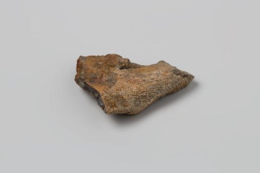 Metal fragment (iron?) with an impression on the surface of a textile structure, from the wreck of the East Indiaman 't Vliegend Hart, lost in 1735