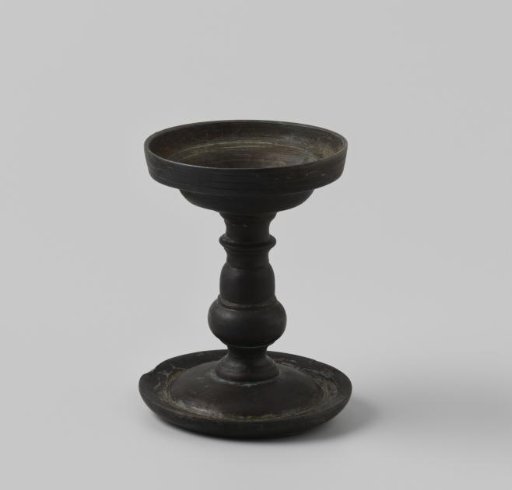 Copper candlestick from the wreck of the Dutch East Indiaman 't Vliegend Hart