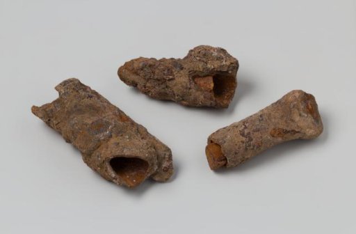 Three iron concretions containing remnants of wooden pins from the wreck of the East Indiaman 't Vliegend Hart, which sank in 1735