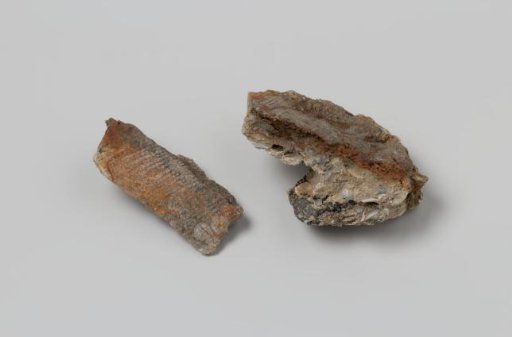 Iron concretions from the wreck of the East Indiaman 't Vliegend Hart, which sank in 1735, with a textile impression