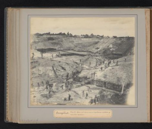 Soengeiliat. Mine 26. Pit with 2 steam pumps and 3 ground hoisting installations driven by steam winches