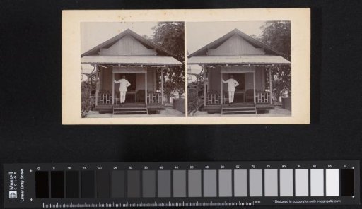 Man in front of a house
