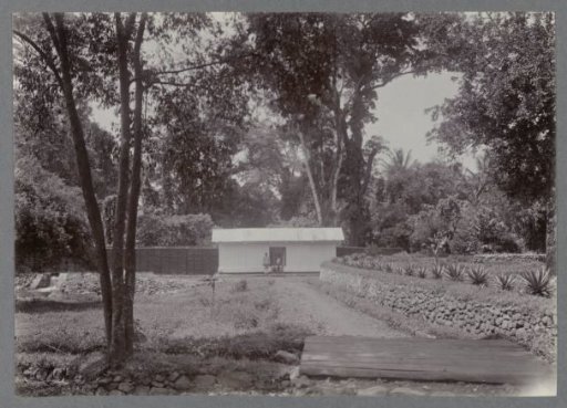 Cottage with a pond