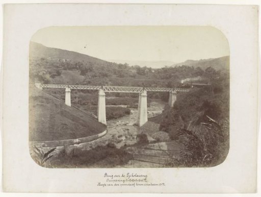 Bridge over the Tjikolawing. Span: 2 x 12 + 20 + 2 x 12 + 8 M. Height of Rail Above Riverbed 25 M.