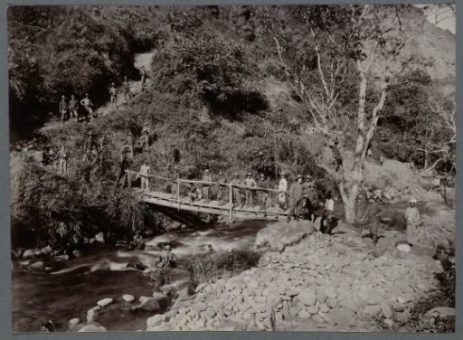 Soldiers and Workers at an Old Bridge