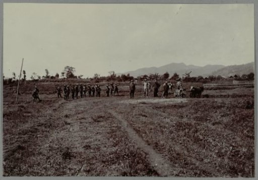 Dutch people and soldiers at Bebesan by the lake