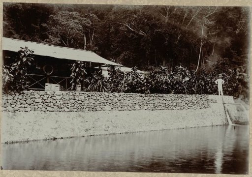 Houses with a stone wall and drainage