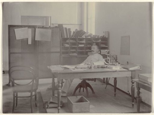 Man behind table
