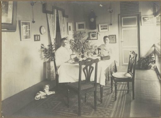 Bennink at a table on a veranda