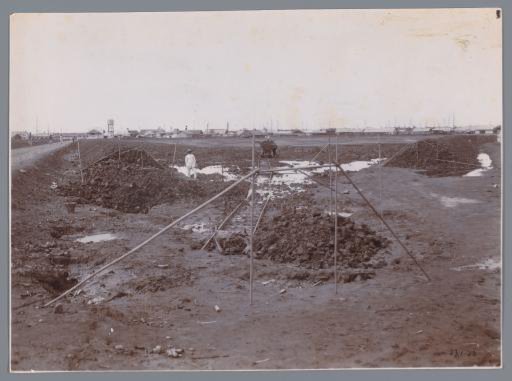 Constructing Press Dikes Around the Housing Quarter to Be Sprayed