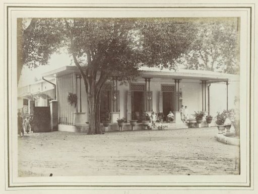 Family in front of a house