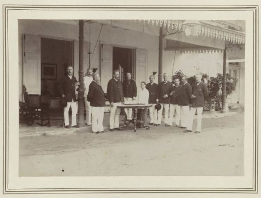 Group photograph in front of a house