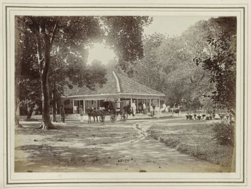 House with carriage and riders