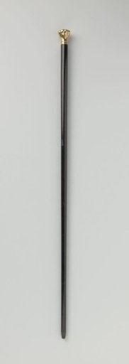 Walking stick of ebony with a knob of red gold