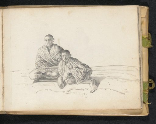 Two men sitting