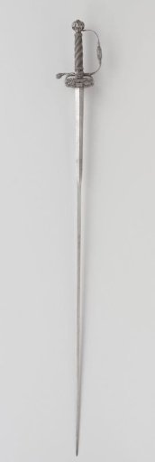 Sword with chiseled iron hilt