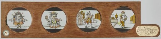 Two dancing little people (caricatures) and two men in a landscape