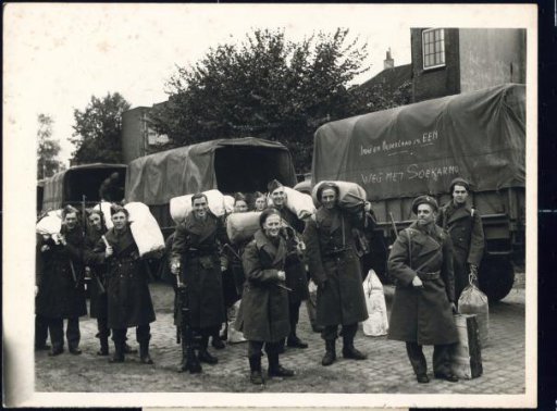 Soldiers Standing in Front of a Truck