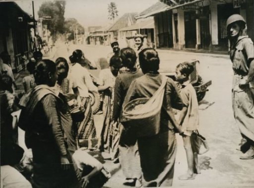 Dutchmen Distributing Rice in Yogyakarta