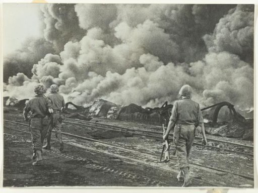Dutch Marines Marching Along a Road in Java