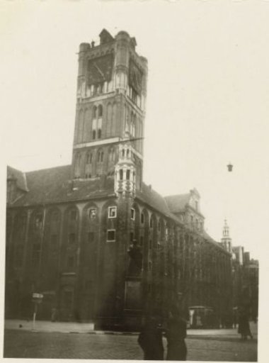 Two persons in front of a church