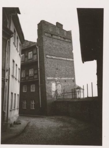 A street with a demolished house