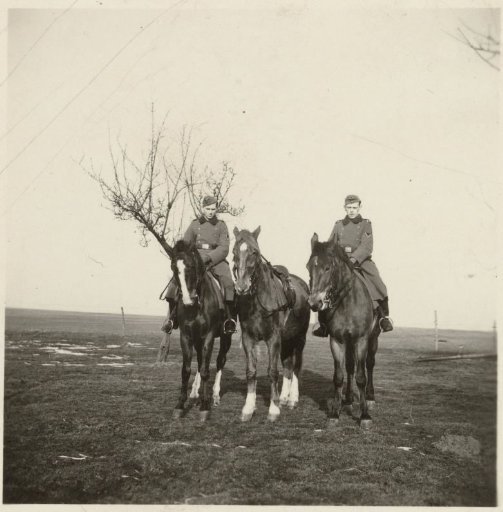 Two Wehrmacht soldiers on horseback