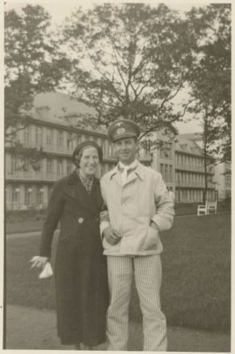 German military man in a striped suit, with his girlfriend