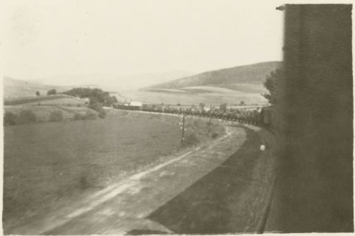 Hilly landscape seen from a train
