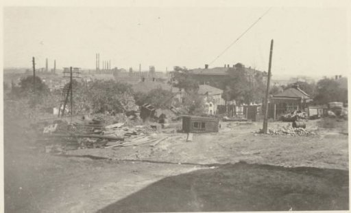 Buildings with some loose building materials in front