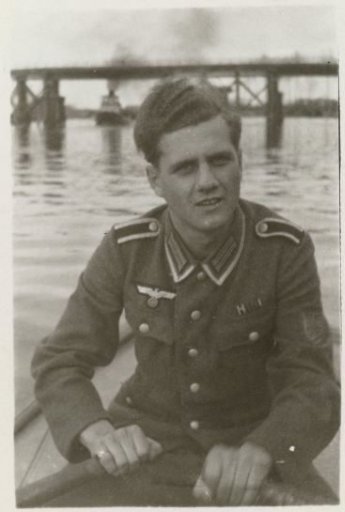 A member of the Wehrmacht in a rowing boat