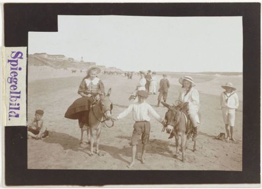 Riding donkeys on the beach in Zandvoort