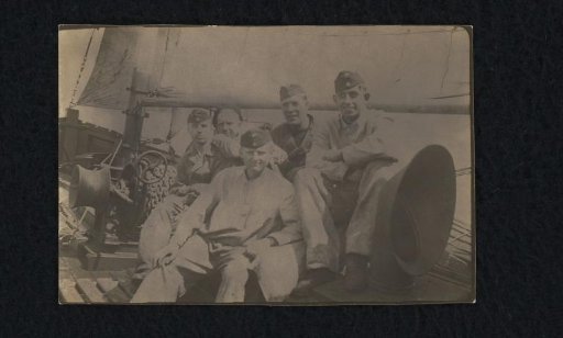 Five sailors on a sailing ship