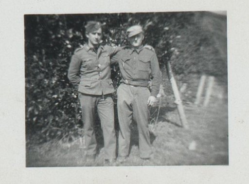 Two sailors in a garden