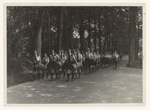 Young Stormers marching through a forest