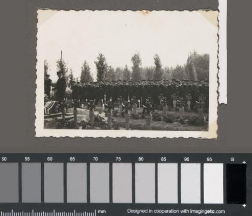 Soldiers at the funeral of three fallen soldiers