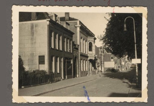 View of the Schiedamseweg in Vlaardingen with the headquarters of the 9. Minenräumflottille of the German Kriegsmarine