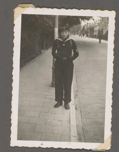 Portrait of Heinrich Clausen in uniform on the street