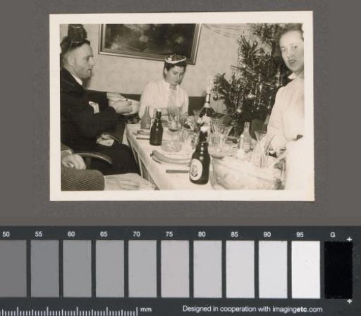 Men and women with festive hats